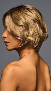 Model is wearing TREND ALERT LUXURY in color GF11-25 SS HONEY PECAN | Chestnut Brown base blends into multi-dimensional tones of Brown and Golden Blonde