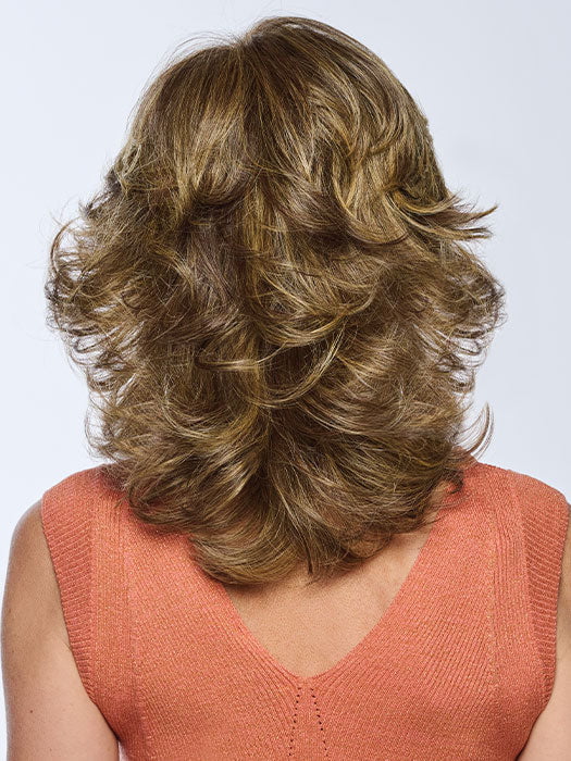 Model is wearing Fierce & Free in BROWN-BLONDE | BROWN-BLONDE | Medium to Light Brown with salon highlights