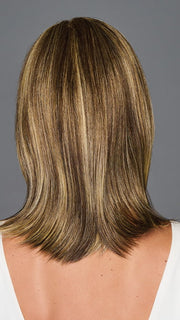 Model is wearing ILLUMINATION by GABOR in color BROWN-BLONDE | Medium to Light Brown with Salon Highlights