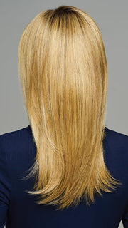 Model is wearing REVERLY by GABOR in color SS-MEDIUM-BLONDE | Medium Blonde with Warm Highlights & Dark Brown 