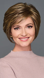 Model is wearing WONDERFUL WIT by GABOR in color BROWN-BLONDE | Medium to Light Brown with Salon Highlights