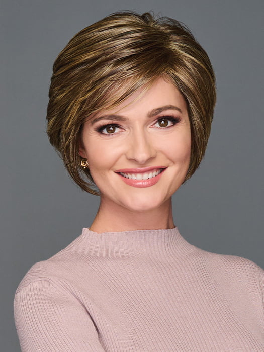Model is wearing WONDERFUL WIT by GABOR in color BROWN-BLONDE | Medium to Light Brown with Salon Highlights