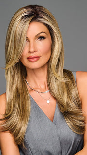 Model is wearing STAY OUT LATE in color GF12-22SS SS SHADED CAPPUCCINO | A radiant blend of warm blonde tones with sunlit highlights and soft dimension