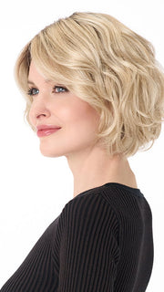 Model is wearing GIA by ENVY in color SILKY BEIGE | Light Platinum Blonde with Dark Brown Roots