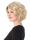 Model is wearing GIA by ENVY in color SILKY BEIGE | Light Platinum Blonde with Dark Brown Roots