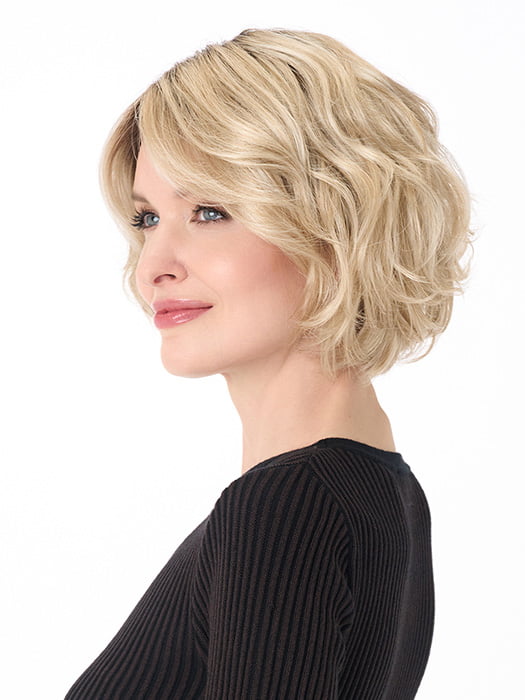 Model is wearing GIA by ENVY in color SILKY BEIGE | Light Platinum Blonde with Dark Brown Roots