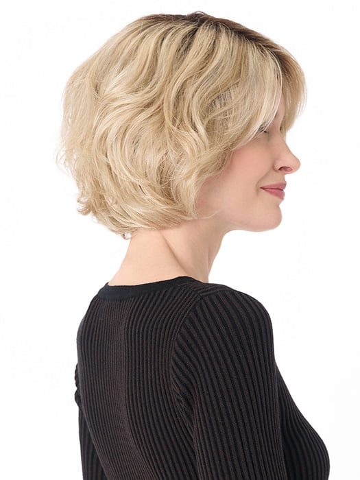 Model is wearing GIA by ENVY in color SILKY BEIGE | Light Platinum Blonde with Dark Brown Roots