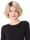 Model is wearing GIA by ENVY in color SILKY BEIGE | Light Platinum Blonde with Dark Brown Roots