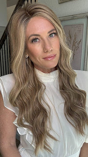 Jenny B. @thewiggygirl is wearing GLAMOUR AND MORE by RAQUEL WELCH in color SS12/22 SHADED CAPPUCCINO | Light Golden Brown Evenly Blended with Cool Platinum Blonde Highlights and Dark Roots (heat styled into waves)