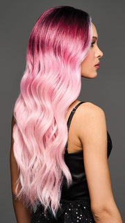 Model is wearing BUBBLEGUM BABE | Dark roots transition into a soft raspberry shade and gradually pales to soft pastel ends. 