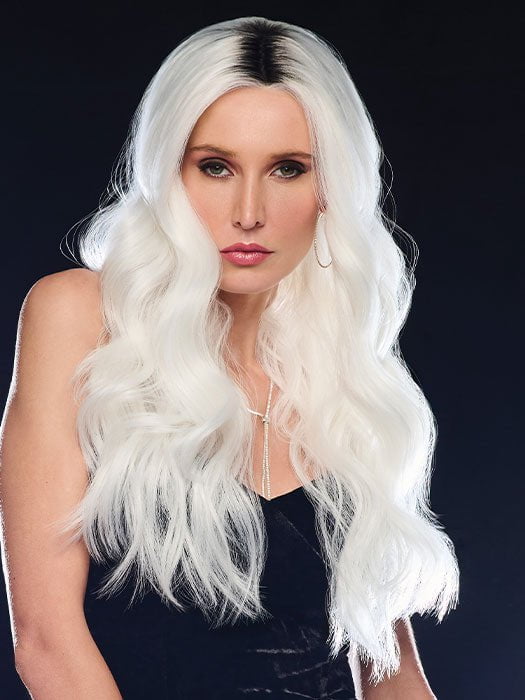 Model is wearing ETHEREAL ICE | Natural dark roots melt into an icy white shade for a beautiful contrast. 
