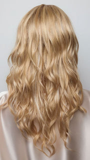 Model is wearing HANA by NORIKO in color Light Ash Blond R | Cream Ash Blonde with ash brown and white-grey roots that blend into a variety of ash blonde tones, including ash pearl blonde, creamy ivory, and pale cream