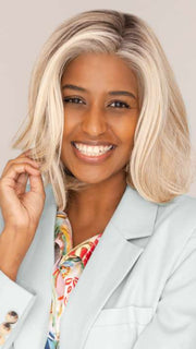 Model is wearing HAUTE by JON RENAU in color 101/88/27S8 CATALINA BLONDE | Pale blonde with Pure White Natural Violet halo highlights, shaded medium brown