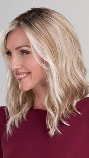 Model is wearing HEIDI by JON RENAU in color 101/88/27S8 CATALINA BLONDE | Pale blonde with Pure White Natural Violet halo highlights, shaded medium brown