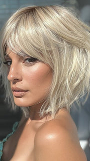 Model is wearing HOLLIS by ESTETICA in color SUNLIT-BLONDE | Soft Blend of Sandy Blonde, Lightest Blonde and Iced Blonde with a Light Golden Brown Root