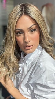 Model is wearing COREY by ENVY in color HONEY BREEZE | A blend of Cool, Honey Blonde and Multi-Dimensional Medium Brown with Darker Brown Roots