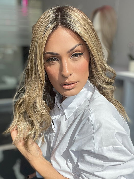 Model is wearing COREY by ENVY in color HONEY BREEZE | A blend of Cool, Honey Blonde and Multi-Dimensional Medium Brown with Darker Brown Roots