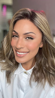 Model is wearing COREY by ENVY in color HONEY BREEZE | A blend of Cool, Honey Blonde and Multi-Dimensional Medium Brown with Darker Brown Roots