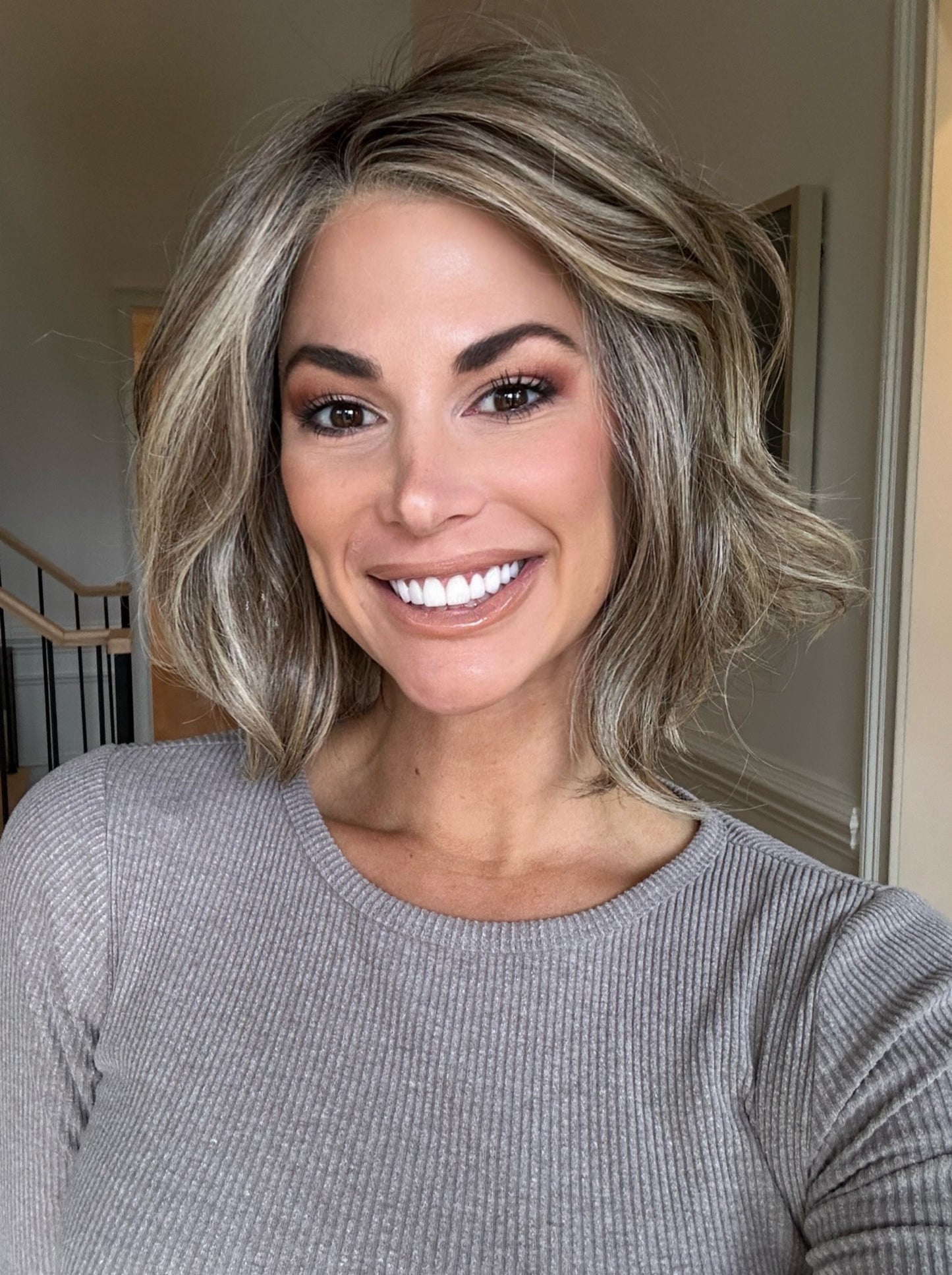 Katy C.  @thewigeducator wearing UNFILTERED by RAQUEL WELCH WIGS in color RL12/22SS SHADED CAPPUCCINO | Light Golden Brown Evenly Blended with Cool Platinum Blonde Highlights with Dark Roots PPC MAIN IMAGE