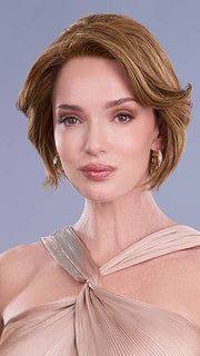 Model is wearing IGNITE HH in color 6F27 CARAMEL RIBBON | Brown with Light Red-Gold Blonde Highlights & Tips