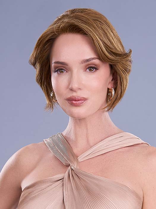 Model is wearing IGNITE HH in color 6F27 CARAMEL RIBBON | Brown with Light Red-Gold Blonde Highlights & Tips