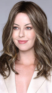 The subtle layers and flowy waves create a stunning hairstyle