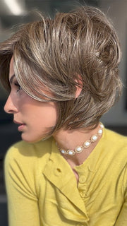 Model is wearing IVY by JON RENAU in shade 8RH14 MOUSSE CAKE | Medium Brown with 33% Medium Natural Blonde Highlights