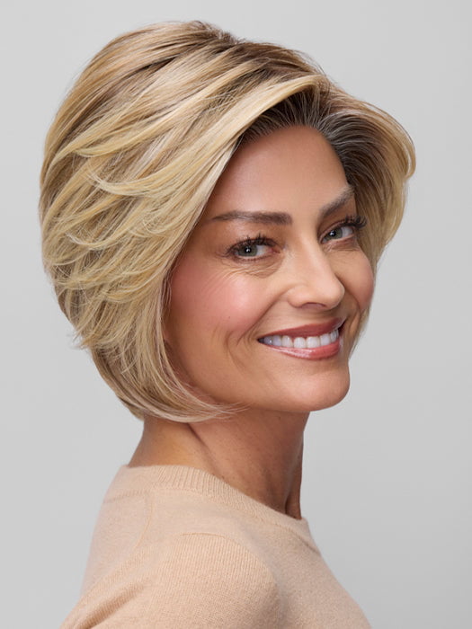 Model is wearing IVY in 12FS8 | SHADED PRALINE | Light Gold Brown, Light Natural Gold Blonde & Pale Natural Gold-Blonde Blend, Shaded with Medium Brown