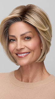 Model is wearing IVY in 12FS8 | SHADED PRALINE | Light Gold Brown, Light Natural Gold Blonde & Pale Natural Gold-Blonde Blend, Shaded with Medium Brown