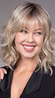 Model is wearing JIL in BUTTERBEER R | Dark Brown Base and Root that transitions smoothly into a buttery blonde, infused with creamy honey and toffee tones