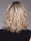 Model is wearing JIL in BUTTERBEER R | Dark Brown Base and Root that transitions smoothly into a buttery blonde, infused with creamy honey and toffee tones