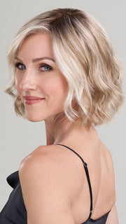 Model is wearing JANUARY by JON RENAU in color 101/88/27S8 CATALINA BLONDE | Pale blonde with Pure White Natural Violet halo highlights, shaded medium brown