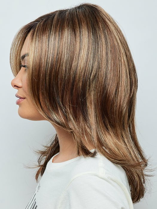 The fashion forward layers create volume that give you a salon blowout look