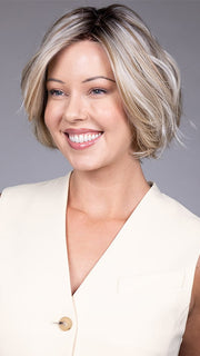 Model is wearing KATE by BELLETRESS in color BUTTERBEER R | Dark Brown Base and Root that transitions smoothly into a buttery blonde, infused with creamy honey and toffee tones