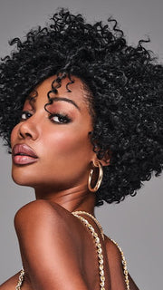 Sassy coiled curls that can be worn straight out of the box or picked out for maximum fullness