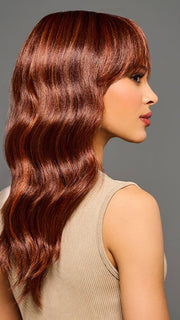 Model is wearing KALIYAH in color MC30/130SS CHERRY COLA | Dark Red with Copper Highlights