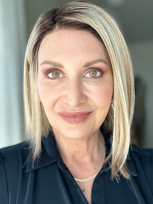 Emily H. @she_sheds_more wearing KAI by RENE OF PARIS in color ROSE-GOLD-R | Blond base with reddish highlights and roots