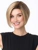Model is wearing KARI by ENVY in color SPARKLING CHAMPAGNE | Medium Brown roots with overall Strawberry Blonde base and soft Golden Blonde highlights