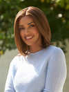 Model is wearing KARLIE by JON RENAU in color 4/27/30 BROWNIE BLONDIES | Dark Brown, Light Red-Gold Blonde & Red-Gold Blend