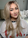 Kendra @_kendradarling_ is wearing KATNISS by BELLE TRESS in color BUTTERCAKE BLONDE-R | A neutral-warm blonde blend featuring light brown, ash, and lightest blonde tones with natural-looking darker roots for added depth and realism.