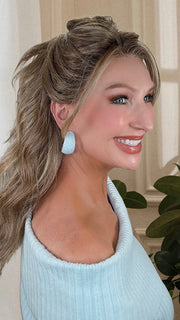Kim Hammon @letstalkwithkim wearing KELLY by BELLE TRESS in color BROWN SUGAR BLONDE-R | A warm, dimensional blend of medium brown and golden blonde highlights with natural-looking darker roots for depth and a sun-kissed finish. (styled into ponytail) 