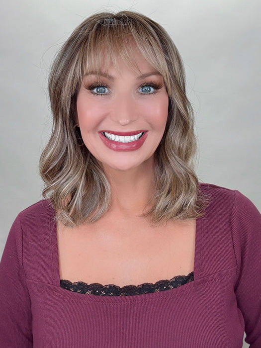 Kim Hammon @letstalkwithkim wearing HEPBURN by BELLE TRESS in color BROWN SUGAR BLONDE-R | A warm, dimensional blend of medium brown and golden blonde highlights with natural-looking darker roots for depth and a sun-kissed finish.