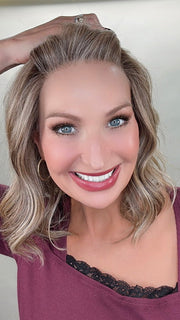 Kim Hammon @letstalkwithkim wearing HEPBURN by BELLE TRESS in color BROWN SUGAR BLONDE-R | A warm, dimensional blend of medium brown and golden blonde highlights with natural-looking darker roots for depth and a sun-kissed finish.