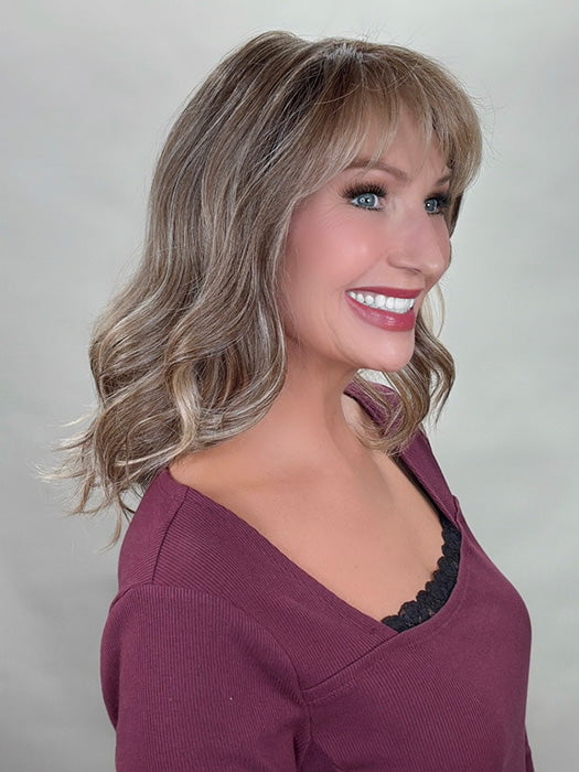 Kim Hammon @letstalkwithkim wearing HEPBURN by BELLE TRESS in color BROWN SUGAR BLONDE-R | A warm, dimensional blend of medium brown and golden blonde highlights with natural-looking darker roots for depth and a sun-kissed finish.