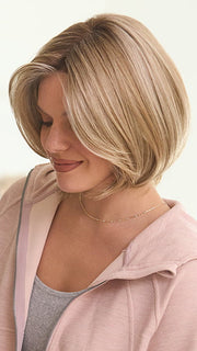 Model is wearing KRISTI by JON RENAU in color 12FS8 SHADED PRALINE | Light Gold Brown, Light Natural Gold Blonde & Pale Natural Gold-Blonde Blend, Shaded with Medium Brown