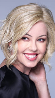This style features an extended lace front and monofilament part for a natural look