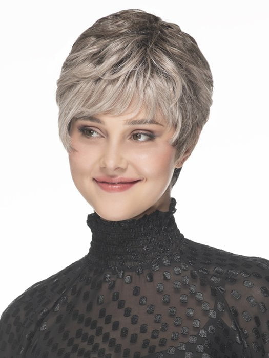 This pixie wig has a layered short top, textured fringe, and tapered back