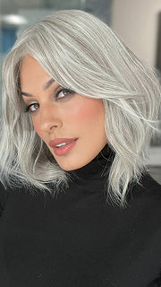 Roxie is wearing HOLLIE PETITE by JON RENAU in shade 56F51 OYSTER | Light Grey with 20% Medium Brown Front, graduating to Grey with 30% Medium Brown Nape (headband not included)