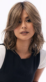 Model is wearing LORYN in  CAFE MISTRO-R |  A chic blend of dark brown, medium brown, and ash blond highlights. Deep brown root for a modern, on-trend look