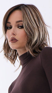 Model is wearing LORYN in SNOWY UMBER R | | Medium Ginger Brown base with White Blond highlights